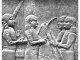 The Babylonians had a high appreciation of music, and large numbers of professional players were attached to royal palaces. This slab from Ashurbanipal`s palace shows twelve-stringed harp, lyre, drum and drumsticks.